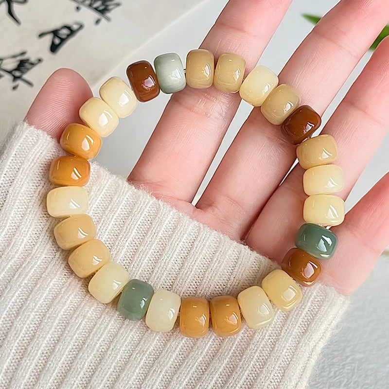 滑らかな仏教徒のルートブレスレット,ピンクと紫の色,柔らかなコード